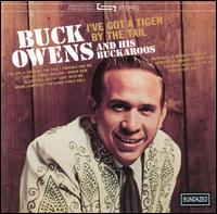 Buck Owens - I've Got a Tiger by the Tail lyrics