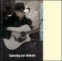 John Arthur Martinez - Spinning Our Wheels lyrics