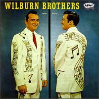 The Wilburn Brothers - Trouble's Back in Town lyrics