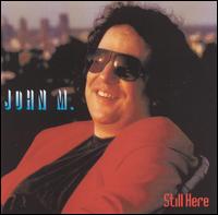 John M - Still Here lyrics