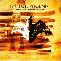Tin Foil Phoenix - Living in the Shadow of the Bat lyrics