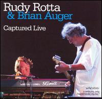 Rudy Band Rotta - Captured Live lyrics