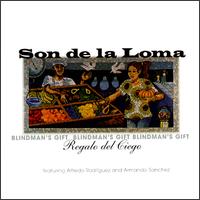 Son de Loma - Regalo del Ciego (Blindman's Gift) lyrics